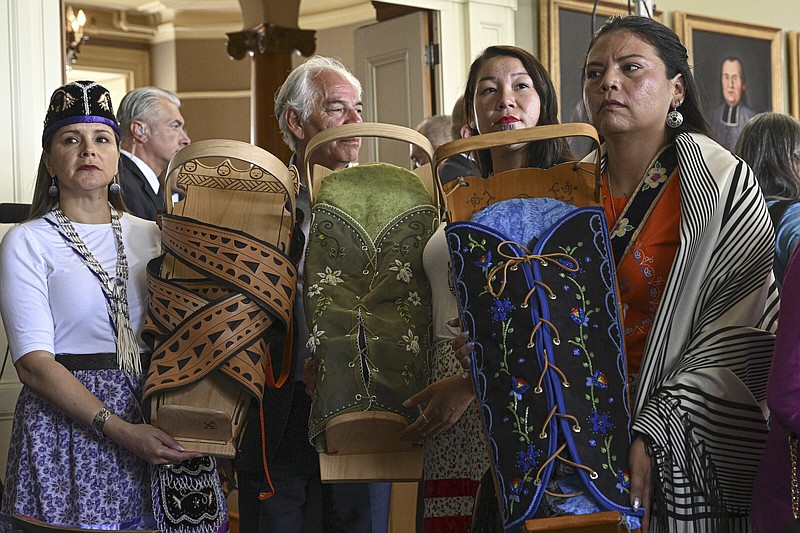 Members of a delegation of Indigenous peoples in Quebec await a meeting with Pope Francis on Friday at the Archbishop’s residence in Quebec City, Canada.
(AP/Ciro Fusco)