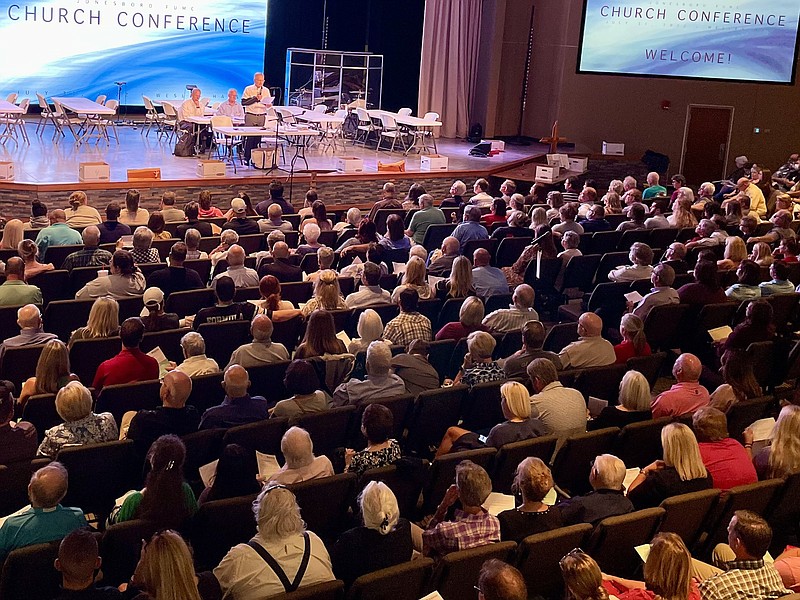 More than 1,350 members of First United Methodist Church in Jonesboro packed Wesley Hall Sunday, July 31, 2022, and heard arguments for and against severing ties with the denomination. Once debate ended, the congregation voted 944 to 412 to disaffiliate. (Arkansas Democrat-Gazette/Frank Lockwood)