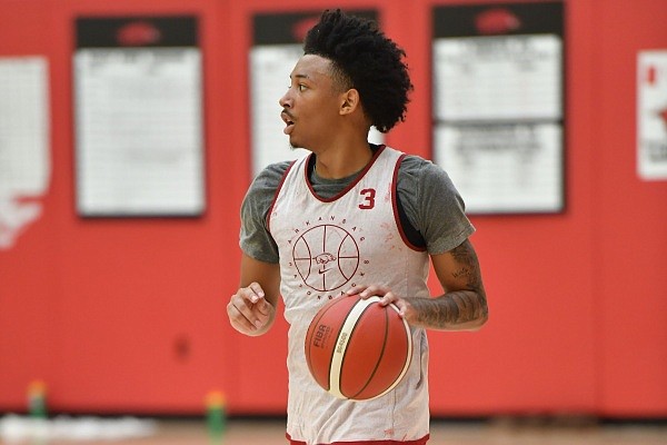 Arkansas guard Nick Smith Jr. drives with the ball Wednesday, July 27, 2022, during practice in the Eddie Sutton Men’s Basketball Practice Gym on the university campus in Fayetteville. Visit nwaonline.com/220728Daily/ for the photo gallery.