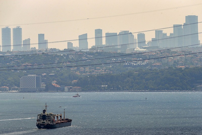 The Sierra Leone-flagged cargo ship Razoni continues on toward Lebanon on Wednesday after being inspected by Russian, Ukrainian, Turkish and U.N. officials at the entrance of the Bosphorus Strait in Istanbul, Turkey. Loaded up with 26,000 tons of corn, the Razoni is the first cargo ship to leave Ukraine since the Russian invasion.
(AP/Emrah Gurel)