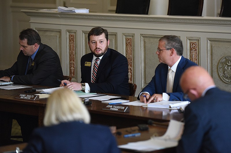 Director Daniel Shults (center) speaks during the Board of Election Commissioners meeting Wednesday at the state Capitol in Little Rock.
(Arkansas Democrat-Gazette/Staci Vandagriff)