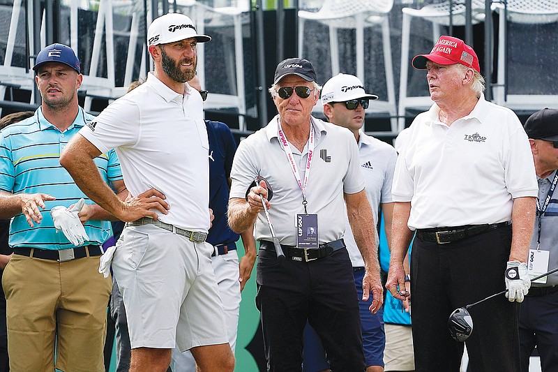 (From left) Bryson DeChambeau, Dustin Johnson, LIV Golf CEO Greg Norman and former President Donald Trump look on during last Thursday’s pro-am round of the Bedminster Invitational LIV Golf tournament in Bedminster, N.J. (Associated Press)