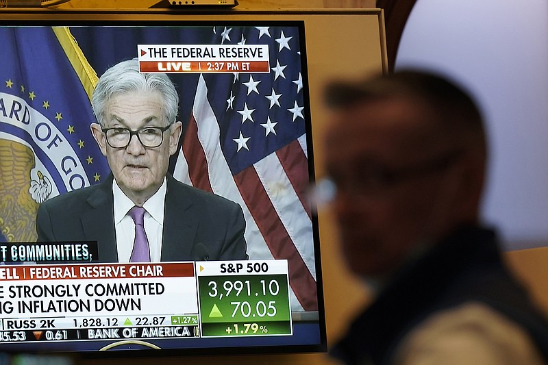 Federal Reserve Chair Jerome Powell announces the most recent Fed rate increase as traders work and watch at the New York Stock Exchange on July 27.
(AP/Seth Wenig)