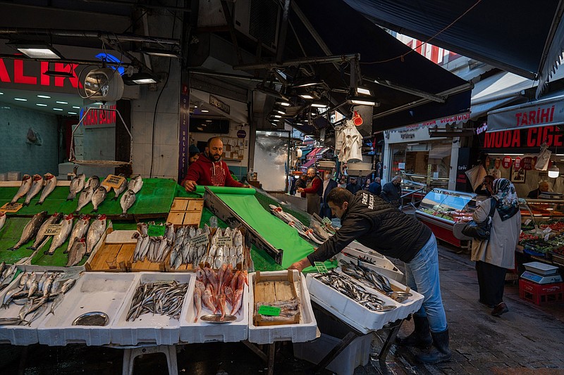 A vendor arranges a display at a fishmonger’s stall in Istanbul, Turkey, in April.
(Bloomberg News WPNS/Erhan Demirtas)