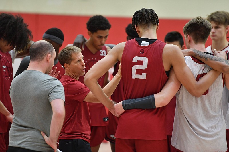 Coach Eric Musselman’s preparations for the Arkansas men’s basketball team’s upcoming European tour includes push-ups for missed free throws — for players, coaches, support staff and graduate assistants.
(NWA Democrat-Gazette/Andy Shupe)