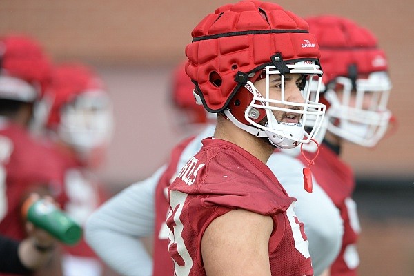 Arkansas defensive lineman Isaiah Nichols takes part in a drill Thursday, March 11, 2021, during practice at the university practice facility in Fayetteville.