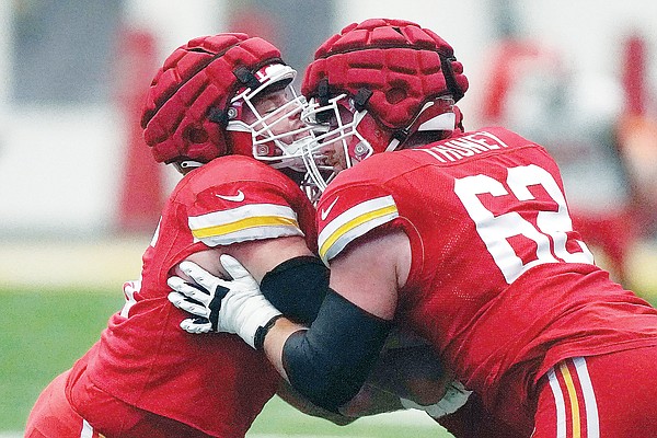 Seeking to reduce head contact, NFL mandates use of Guardian Cap helmet for  early portion of training camp - ESPN