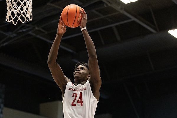 Annor Boateng (24) of the Arkansas Hawgs goes up for a shot during the Real Deal in the Rock on Saturday, March 26, 2022, in Little Rock.