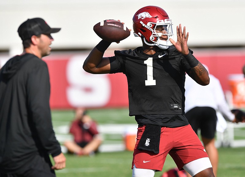 Arkansas quarterback KJ Jefferson passes Friday, Aug. 5, 2022, during practice at the university practice facility in Fayetteville. Visit nwaonline.com/220806Daily/ for today's photo gallery. .(NWA Democrat-Gazette/Andy Shupe)