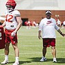 Arkansas tight end coach Dowell Loggains (right) leads a practice, Saturday, August 6, 2022 during a football practice at University of Arkansas practice football field in Fayetteville. Visit nwaonline.com/220807Daily/ for today's photo gallery.......(NWA Democrat-Gazette/Charlie Kaijo)