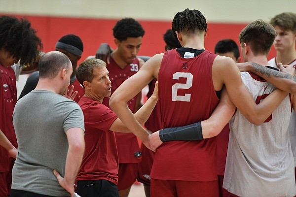Arkansas coach Eric Musselman speaks to his players Wednesday, July 27, 2022, during practice in the Eddie Sutton Men’s Basketball Practice Gym on the university campus in Fayetteville.