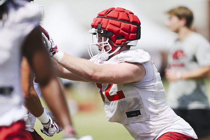 Arkansas tight end Hudson Henry (82) practices, Saturday, August 6, 2022 during a football practice at University of Arkansas practice football field in Fayetteville. Visit nwaonline.com/220807Daily/ for today's photo gallery...(NWA Democrat-Gazette/Charlie Kaijo)