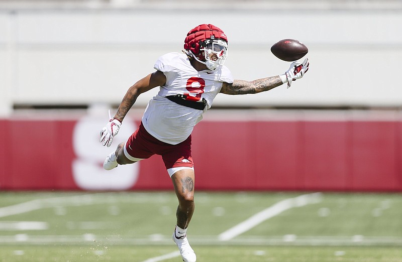 Arkansas wide receiver Jadon Haselwood (9) practices, Monday, August 8, 2022 during a football practice at University of Arkansas practice football field in Fayetteville. Visit nwaonline.com/220809Daily/ for today's photo gallery...(NWA Democrat-Gazette/Charlie Kaijo)