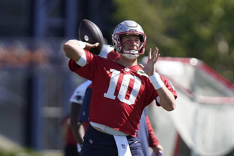 New England quarterback Mac Jones had the most success of any rookie quarterback in the NFL last season, but now he must shoulder more of the offensive load for the Patriots while dealing with the loss of former offensive coordinator Josh McDaniels to the Las Vegas Raiders.
(AP/Steven Senne)