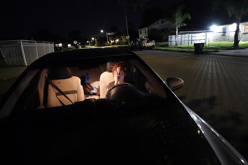 Jada Riley sits in her car at night with her son Jayden Harris, 6, as she contemplates where she might spend the night, having had to move out of her apartment a few days before, Thursday, July 28, 2022, in New Orleans. â€œI've slept outside for a whole year before. It's very depressing, I'm not going to lie,â€ said Riley, who often doesn't have enough money to buy gas or afford food every day. â€œI don't want to have my son experience any struggles that I went through.â€ (AP Photo/Gerald Herbert)