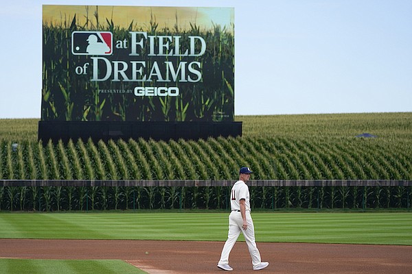 Chicago Cubs starting pitcher Drew Smyly walks on the field before a baseball game against the Cincinnati Reds at the Field of Dreams movie site, Thursday, Aug. 11, 2022, in Dyersville, Iowa. (AP Photo/Charlie Neibergall)