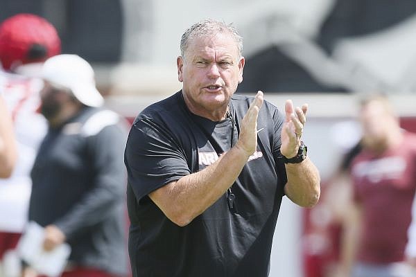 Arkansas coach Sam Pittman directs his players Thursday, Aug. 11, 2022, during practice at the university practice field.