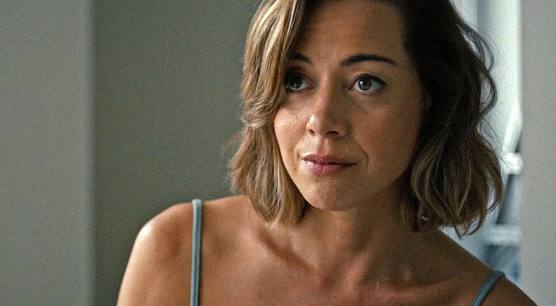 Unemployed millennial and convicted felon Emily (Aubrey Plaza) weighs her limited options in John Patton Ford’s “Emily the Criminal,” a plausible horror film about debt and determination.