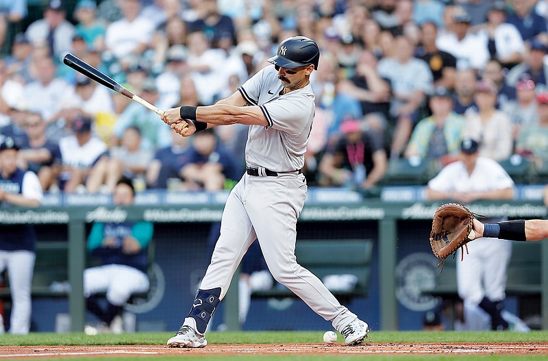 Matt Carpenter of the Yankees fouls a ball off his foot in the first inning of Monday night’s game against the Mariners in Seattle. (Associated Press)