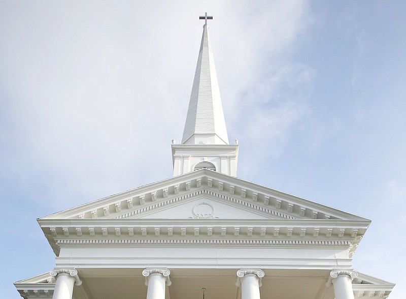The steeple of Central United Methodist Church on Dickson Street in Fayetteville is shown in this April 7, 2014 file photo. (NWA Democrat-Gazette/David Gottschalk)