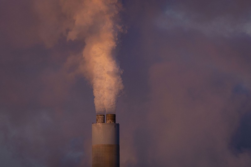 Carbon dioxide and other pollutants billow from a stack at PacifiCorp’s coal-fired Naughton Power Plant in Kemmerer, Wyo., in January.
(AP/Natalie Behring)