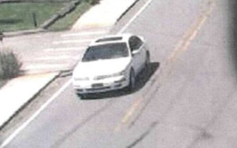 This photo of a white four-door sedan with tinted windows and a sunroof was shared by the Pulaski County sheriff's office on Sunday, Aug. 14, 2022. Deputies said the vehicle was seen in the area of 3M Road and Frazier Pike, and said the people inside the vehicle were wanted for questioning in a Sunday homicide. (Courtesy photo/Pulaski County sheriff's office)