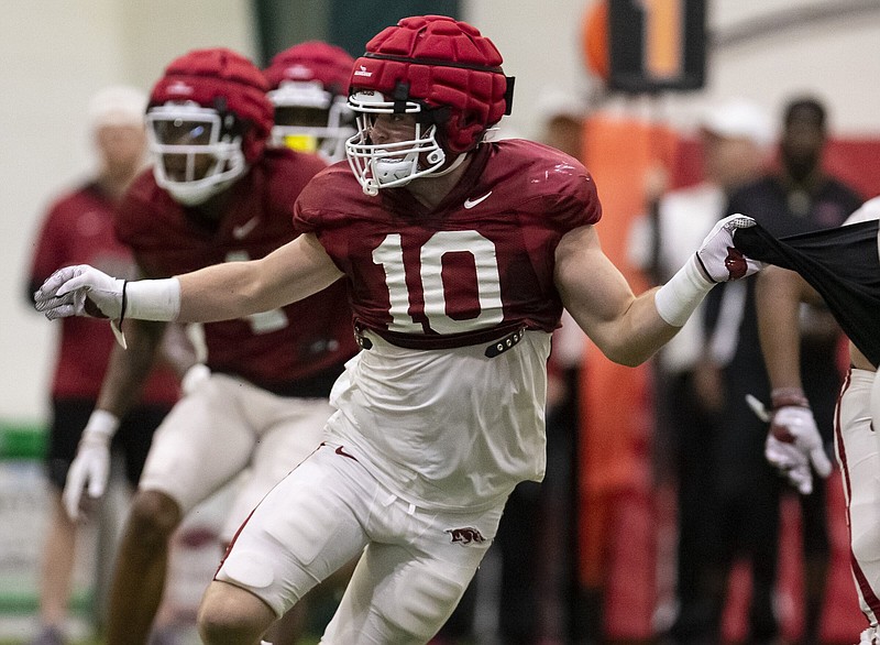 Arkansas senior Bumper Pool (10) defends on Saturday, April 16, 2022, at the Fred W. Smith Football Center, Fayetteville, Arkansas.  Visit nwaonline.com/220417Daily/ for today's photo gallery..(Special to the NWA Democrat-Gazette/David Beach)