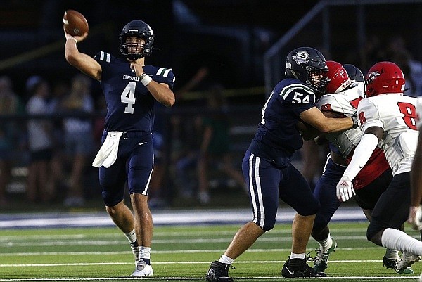 Little Rock Christian's Walker White (4) throws a pass during the first quarter on Friday, Sept. 24, 2021, in Little Rock.