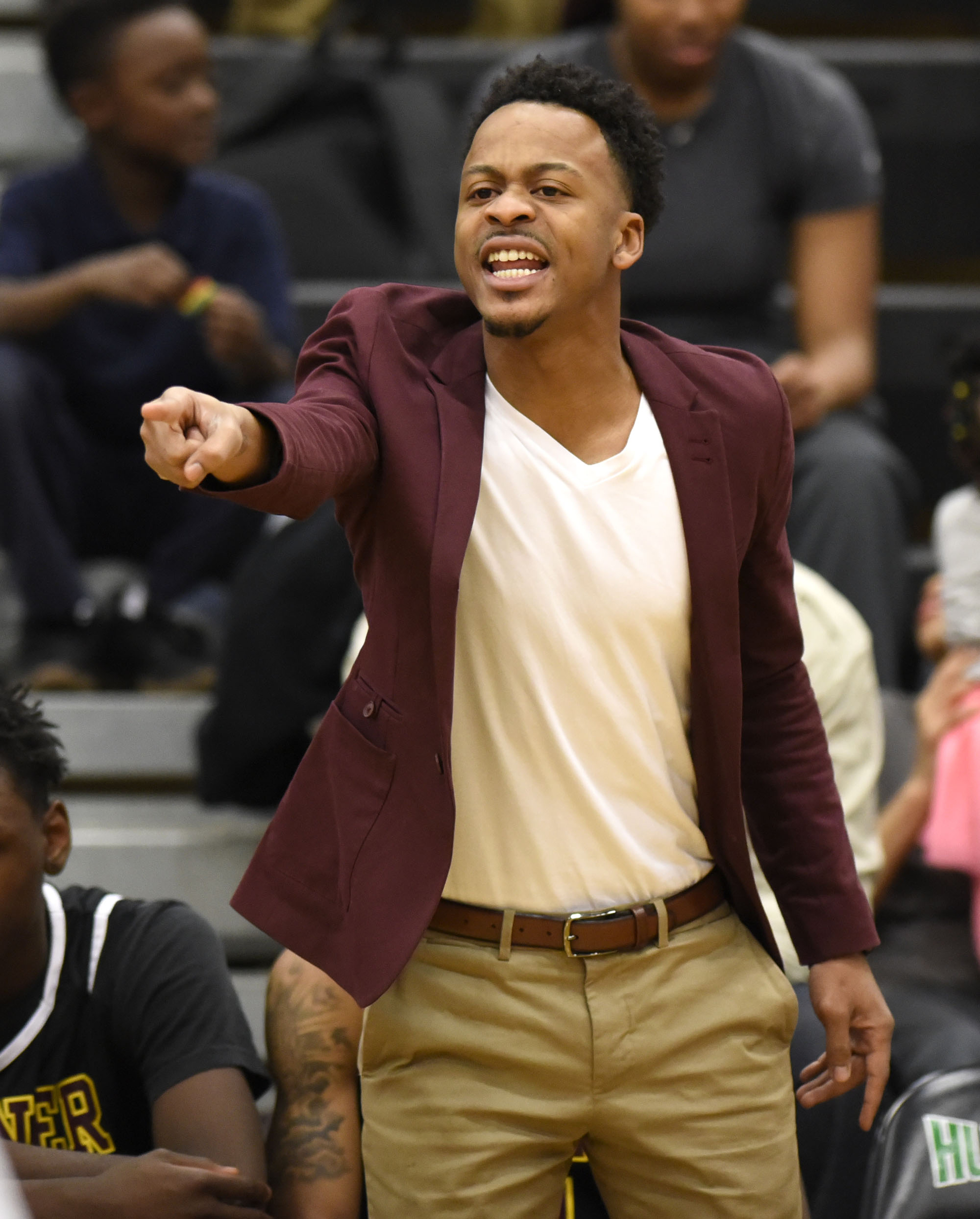 Staff Photo by Robin Rudd.Tyner head coach E'Jay Ward directs the rams. The Tyner Rams visited the East Hamilton Hurricanes in TSSAA basketball action on January 19, 2018.