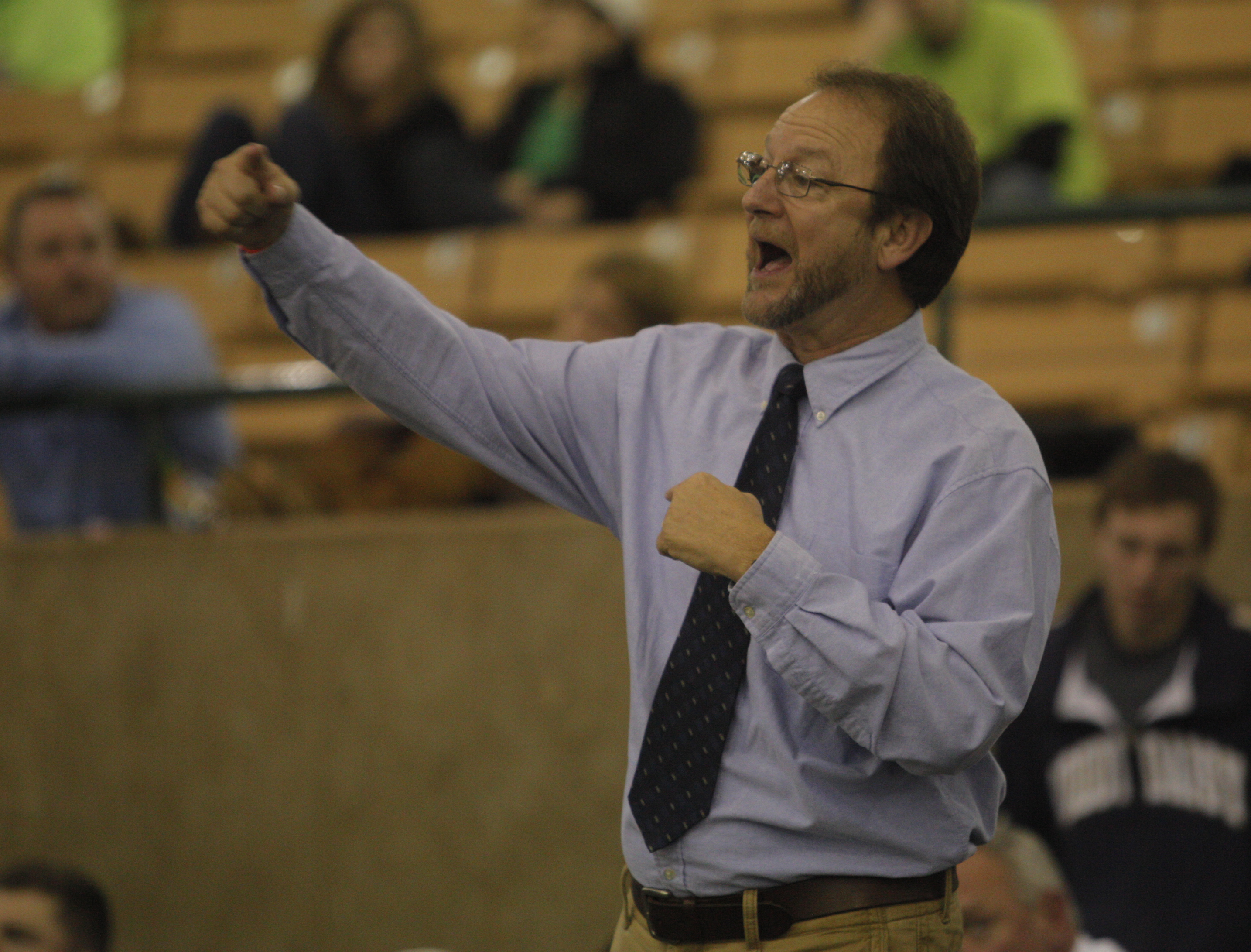 Staff Photo by Jake Daniels, Chattanooga Times Free Press.Soddy-Daisy coach Steve Henry {CQ} motions to a wrestler during his match Saturday. Soddy-Daisy wrestled against Cleveland and Central wrestled against Pigeon Forge at the Williamson Agricultural Expo Center in Franklin, Tenn., on Saturday night during the Tennessee state duals wrestling championships.