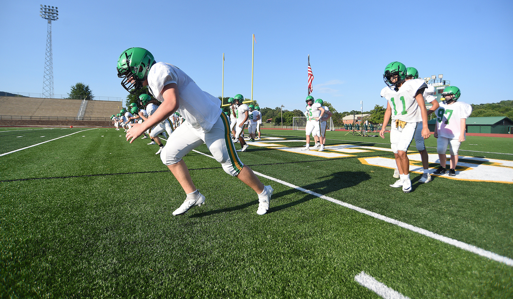 Staff photo by Matt Hamilton / Rhea County High School players warm up before their scrimmage against White County at Rhea County High School on Tuesday, August 2, 2022.