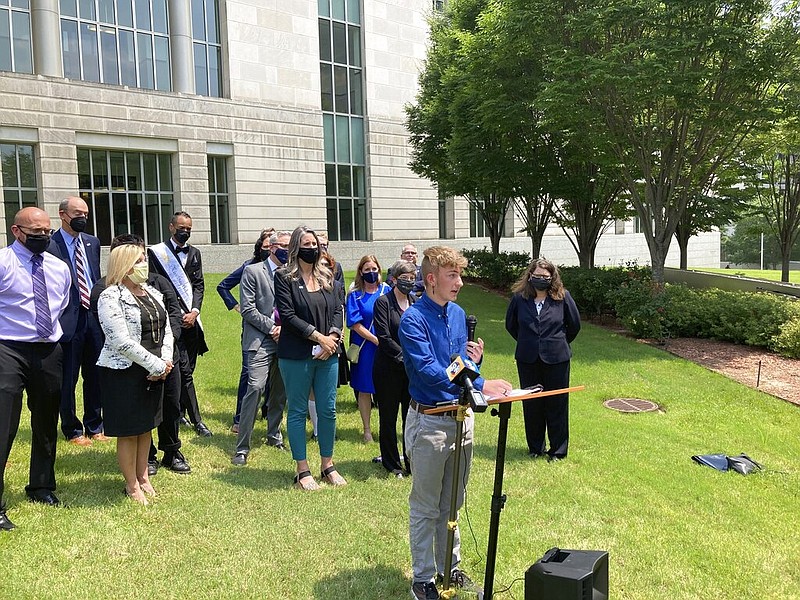 FILE - Dylan Brandt speaks at a news conference outside the federal courthouse in Little Rock on Wednesday, July 21, 2021. (AP/Andrew DeMillo, File)