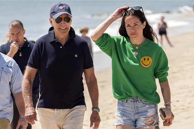 FILE â€” President Joe Biden walks on the beach with daughter Ashley Biden, in Rehoboth Beach, Del., June 20, 2022. Two people have pleaded guilty in a scheme to peddle a diary and other items belonging to President Joe Biden's daughter Ashley to the conservative group Project Veritas, prosecutors said Thursday, Aug. 25, 2022. (AP Photo/Manuel Balce Ceneta, File)