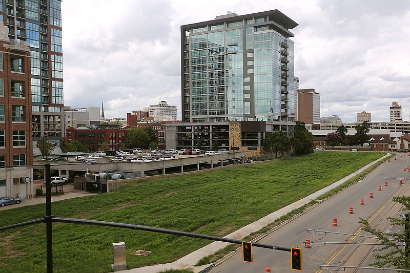 The area of the former I-30 exit ramp which was torn down as part of the 30 Crossing project has a number of proposed uses. .(Arkansas Democrat-Gazette/Thomas Metthe)
