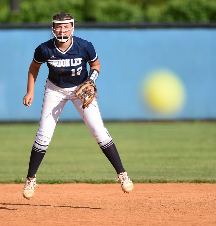 Staff photo by Matt Hamilton / Gordon Lee (12) Gracie Helton hops in the air as the pitch flies toward home plate during a game against Ringgold on Tuesday, August 30, 2022 at Ringgold High School.