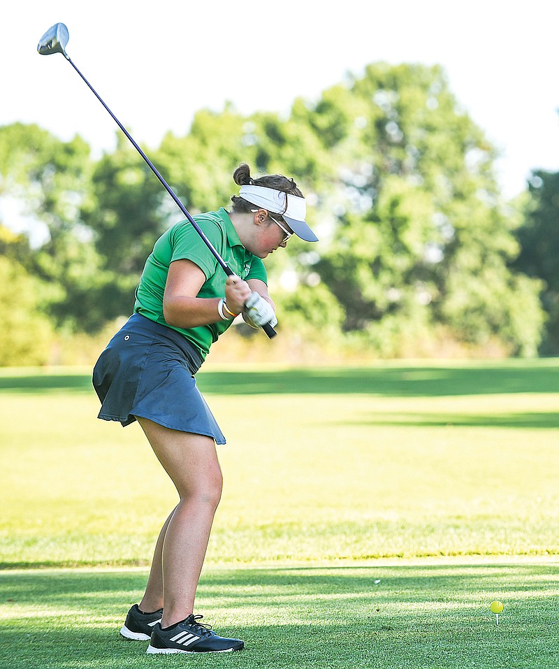 Addison Branum of Blair Oaks prepares to hit her tee shot during the Lady Crusader Invitational last season at Meadow Lake Acres Country Club. (Julie Smith/News Tribune)