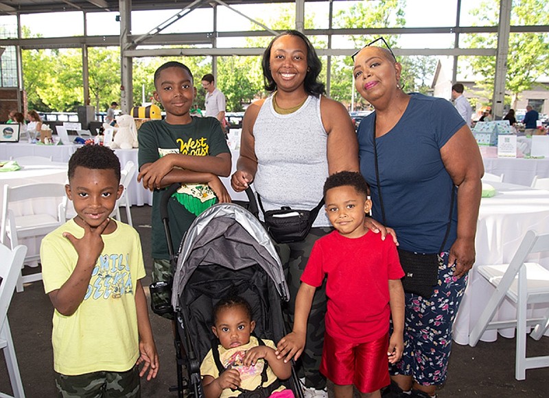 Photo by Mark Gilliland / Akinyele, Tahiry, Yuri, Kadrian, Taelor and Lisa Gearing