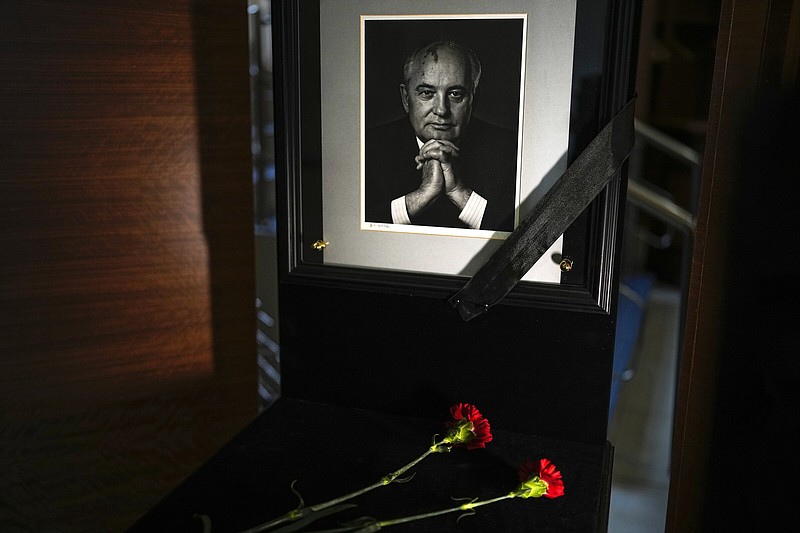 A portrait of former Soviet President Mikhail Gorbachev and flowers are placed at his foundation’s headquarters Wednesday, a day after his death, in Moscow, Russia.
(AP/Alexander Zemlianichenko)