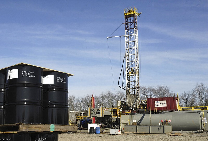 A gas drilling rig is shown near Quitman in this Feb. 5, 2007 file photo. (AP/Mike Wintroath)