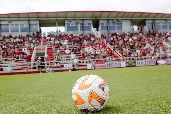 A soccer ball sits on the field during a game between Arkansas and Arkansas State on Sunday, Aug. 28, 2022, in Fayetteville.