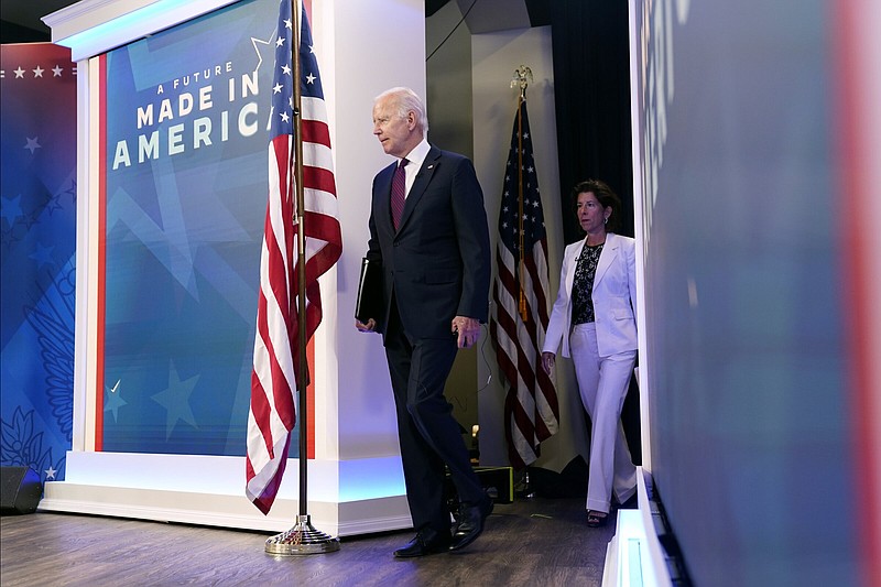 President Joe Biden arrives Friday with Commerce Secretary Gina Raimondo to speak about the American Rescue Plan during an event in the South Court Auditorium on the White House campus in Washington.
(AP/Evan Vucci)