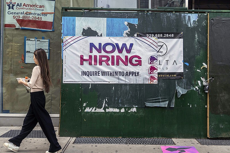 A sign advertises job openings at a construction site in Manhattan in July during a month of blockbuster gains in hiring. August job growth was down, but still showed strength, according to economists.
(The New York Times/Hiroko Masuike)