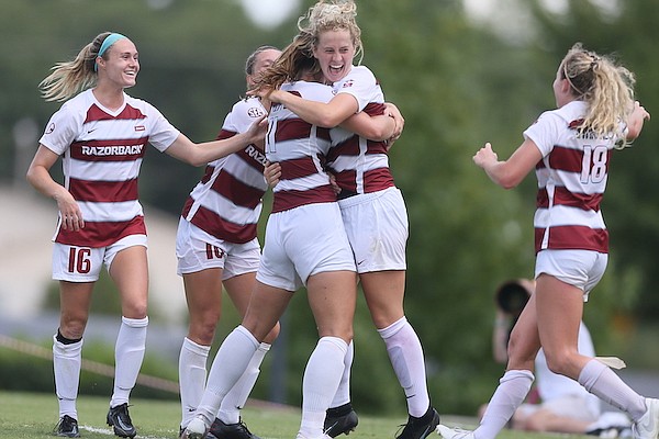 Arkansas' Bea Franklin (second from right) celebrates a goal during a game against Michigan State on Sunday, Sept. 4, 2022, in Fayetteville.