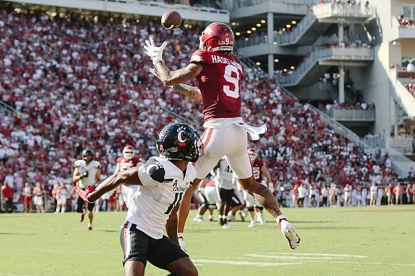 WholeHogSports - Wolfpack stumble against hot-hitting Hogs