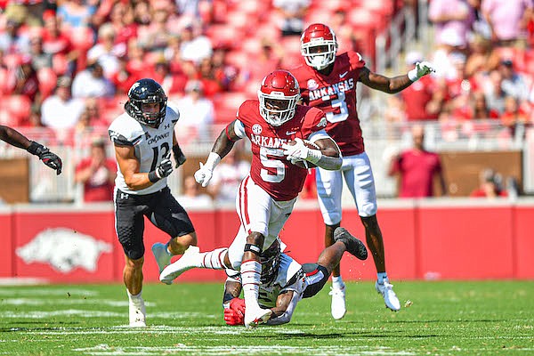 Arkansas running back Raheim Sanders carries the ball during a game against Cincinnati on Saturday, Sept. 3, 2022, in Fayetteville.