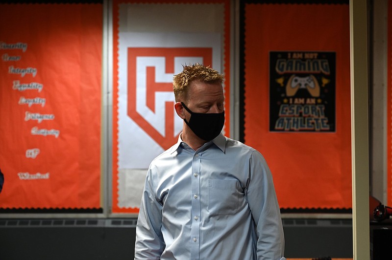 Jeff Wood, then the Zone 9 board member with the Little Rock School District Board of Education, looks at a row of computers in the gaming area of the new Hall STEAM Magnet High School during a tour of the school in this March 5, 2021 file photo. (Arkansas Democrat-Gazette/Stephen Swofford)