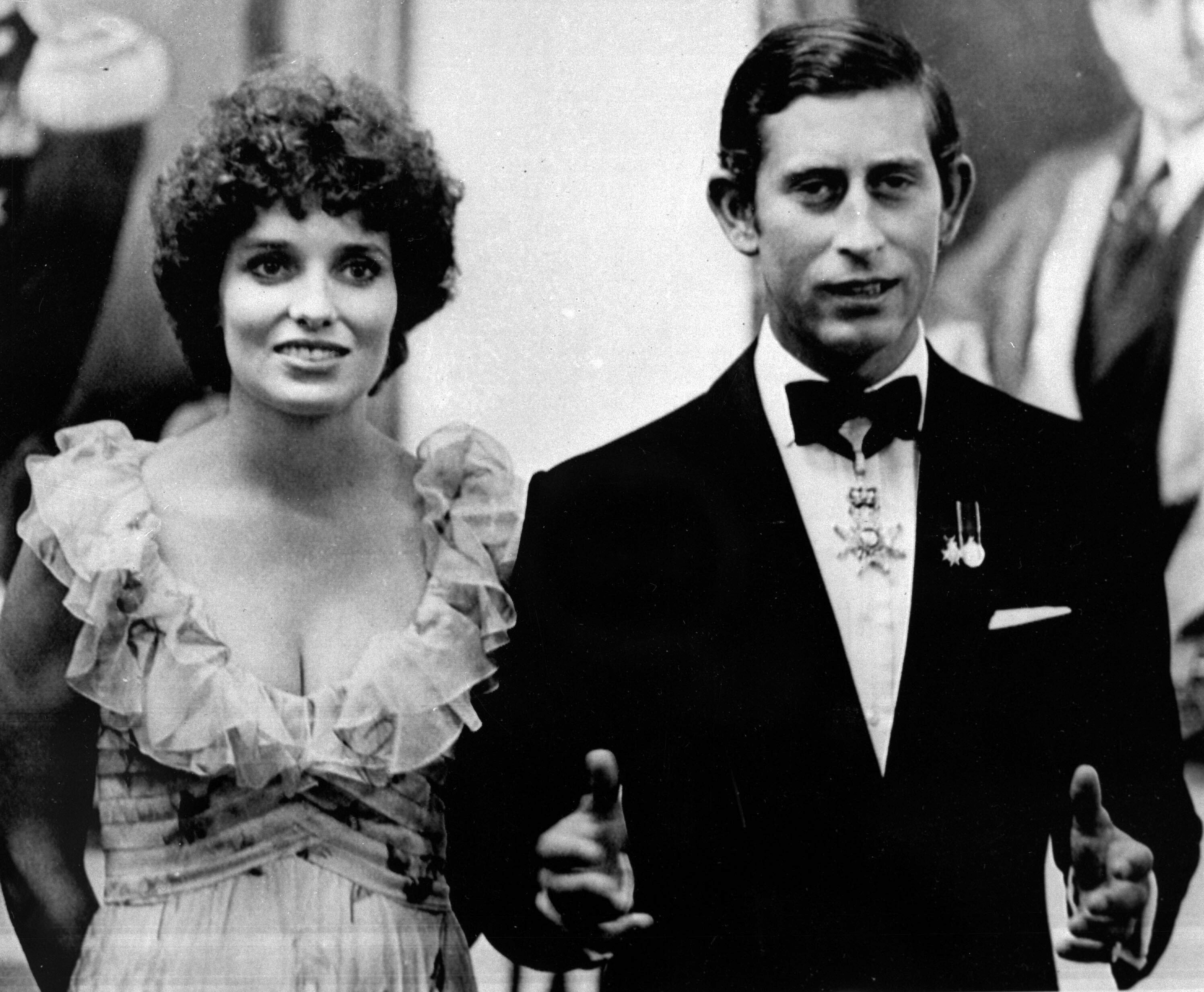FILE -  In this April 22, 1975 file photo, Britian's'Prince Charles, right, and Margaret Trudeau, wife of Canadian Prime Minister Pierre Trudeau, are photographed before dinner at Government House in Ottawa, Canada. Prince Charles has been preparing for the crown his entire life. Now, that moment has finally arrived. Charles, the oldest person to ever assume the British throne, became king on Thursday Sept. 8, 2022, following the death of his mother, Queen Elizabeth II. (AP Photo, File)