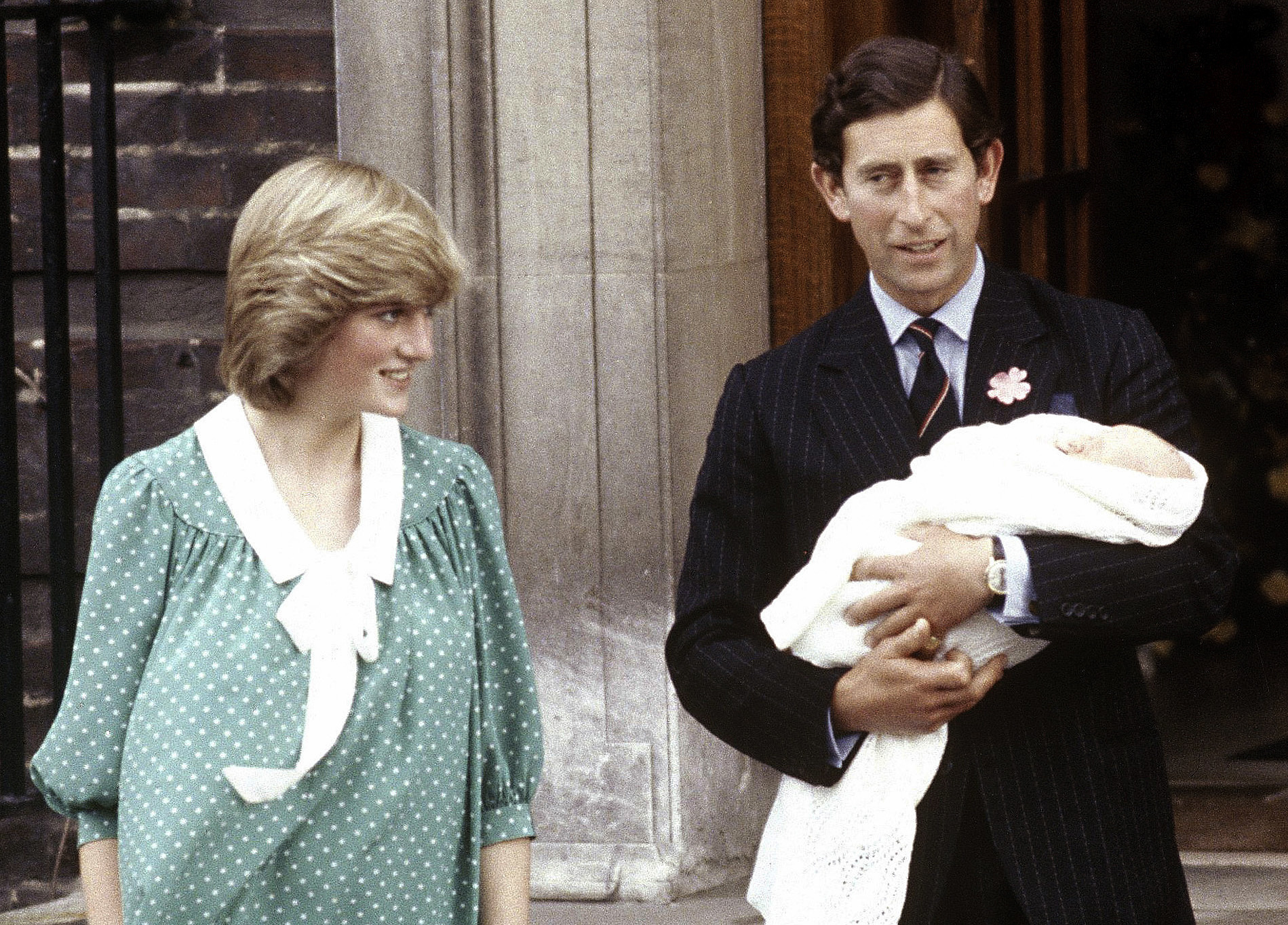 FILE - In this June 22, 1982 file photo, Britain's Prince Charles, Prince of Wales, and wife Princess Diana take home their newborn son Prince William, as they leave St. Mary's Hospital in London. (AP Photo/John Redman, File)