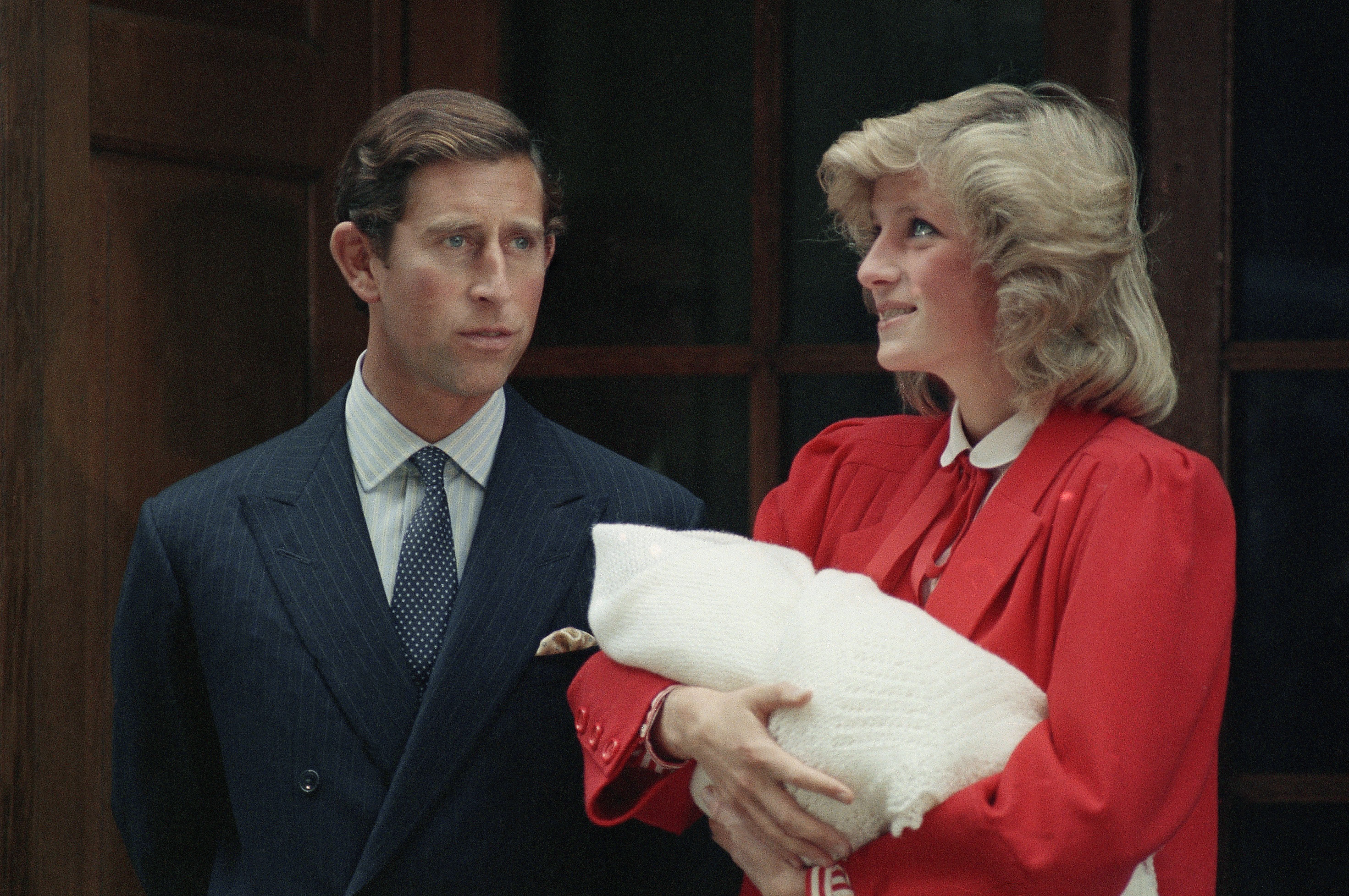 FILE - In this Sept. 16, 1884 file photo, Britain's Prnice Charles and Princess Diana leave St. Mary's Hospital in Paddington, London with their new baby son. Prince Charles has been preparing for the crown his entire life. Now, that moment has finally arrived. Charles, the oldest person to ever assume the British throne, became king on Thursday Sept. 8, 2022, following the death of his mother, Queen Elizabeth II. (AP Photo/File)