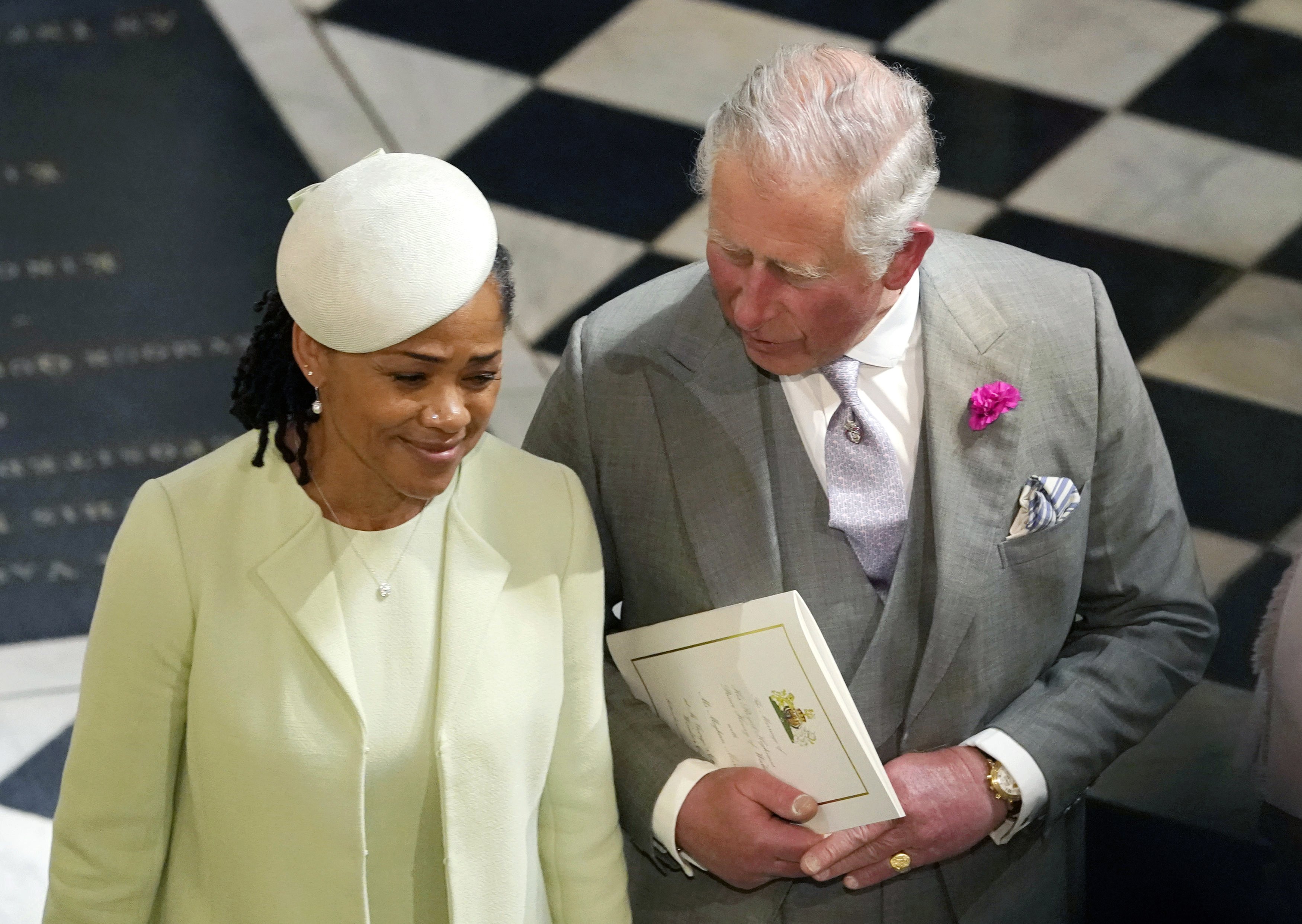 FILE - In this Saturday, May 19, 2018 file photo, Britain's Prince Charles and Doria Ragland, mother of the bride, depart after the wedding ceremony of Prince Harry and Meghan Markle at St. George's Chapel in Windsor Castle in Windsor, near London, England. Prince Charles has been preparing for the crown his entire life. Now, that moment has finally arrived. Charles, the oldest person to ever assume the British throne, became king on Thursday Sept. 8, 2022, following the death of his mother, Queen Elizabeth II. (Owen Humphreys/Pool via AP, File)